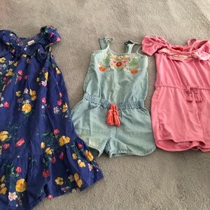 Bundle of jumpsuits and dress